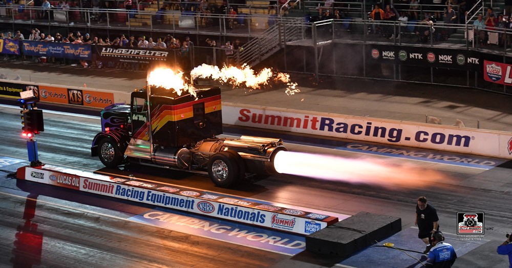 jet truck racing down drag strip at summit racing motorsports park in norwalk, ohio