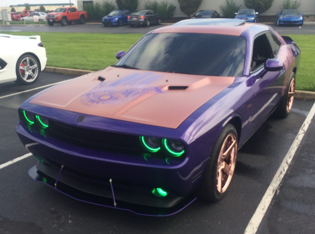 Dodge challenger late model with custom hood and headlights