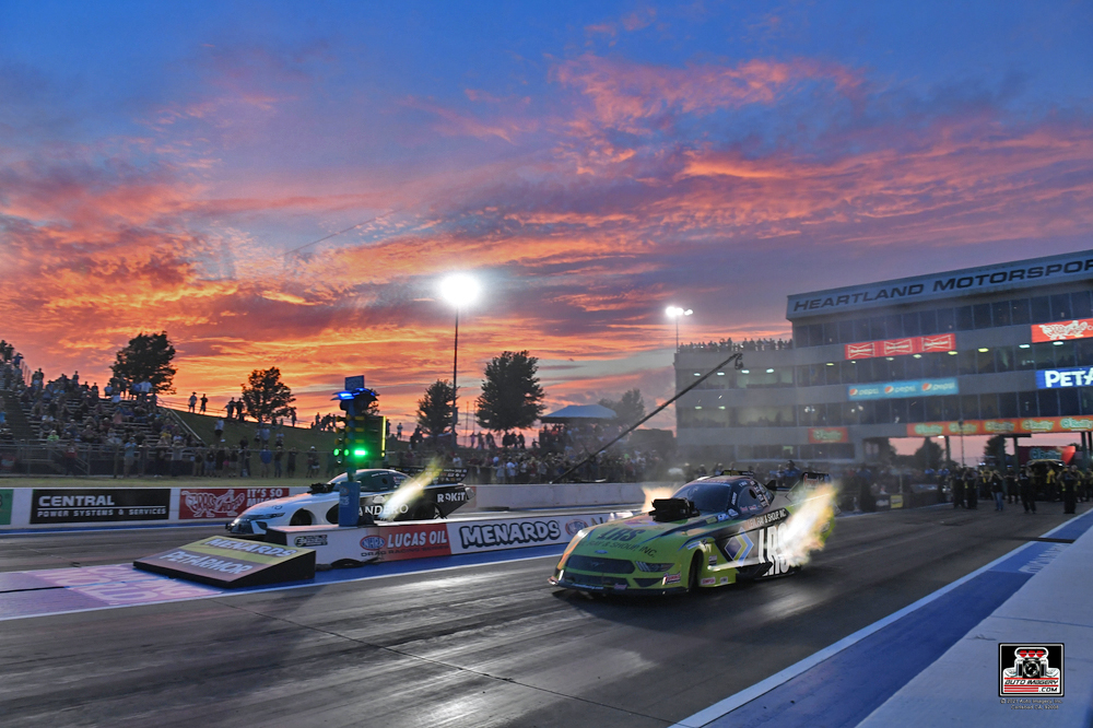 two funny cars drag race at 2021 nhra heartland nationals