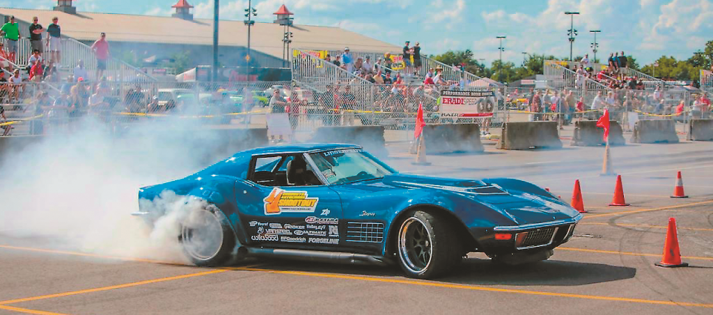 c3 corvette in autocross event drifting through turn