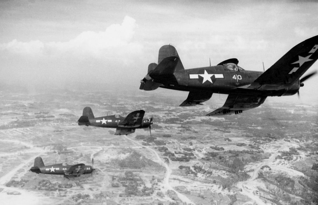vintage photo of a group of goodyear-built corsair airplanes in flight