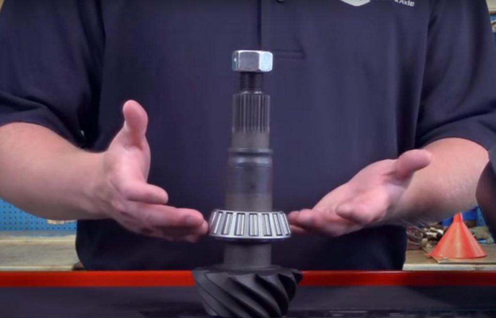 ring and pinion gear being showcased on a workbench