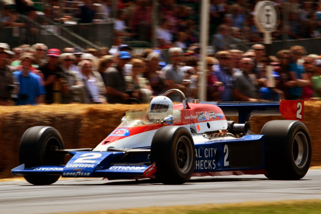 al unser senior races his lola race car at the 2014 goodwood festival of speed