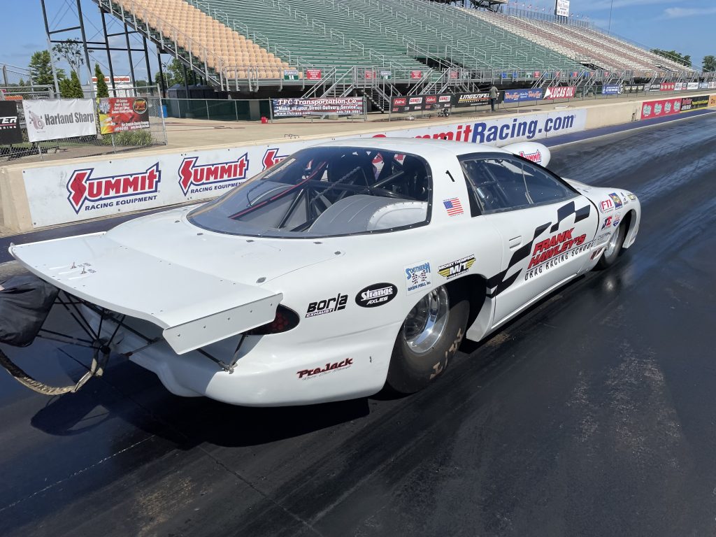 pro stock nhra trans am from frank hawley's drag racing school prepares to launch at drag strip