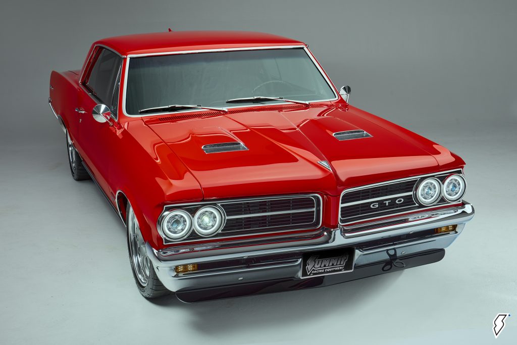 front bumper & grille of a custom red 1964 pontiac gto autocross car