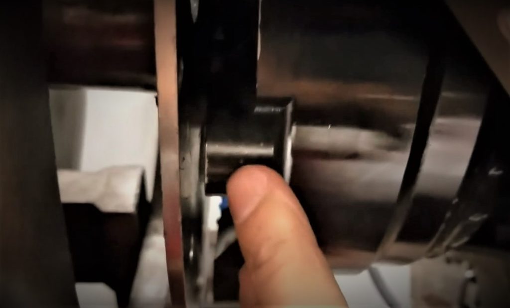 Man pointing to torque converter pullout space