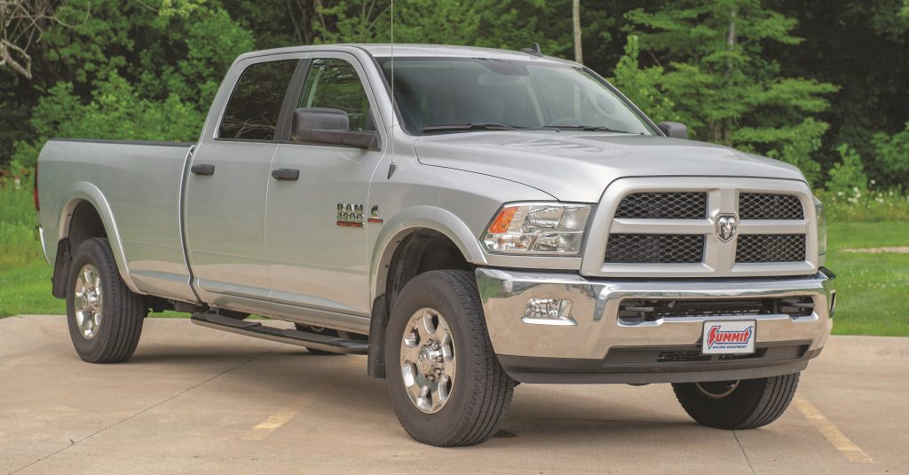 2018 Ram 2500 Cummins Diesel Silver Pickup Truck in parking lot
