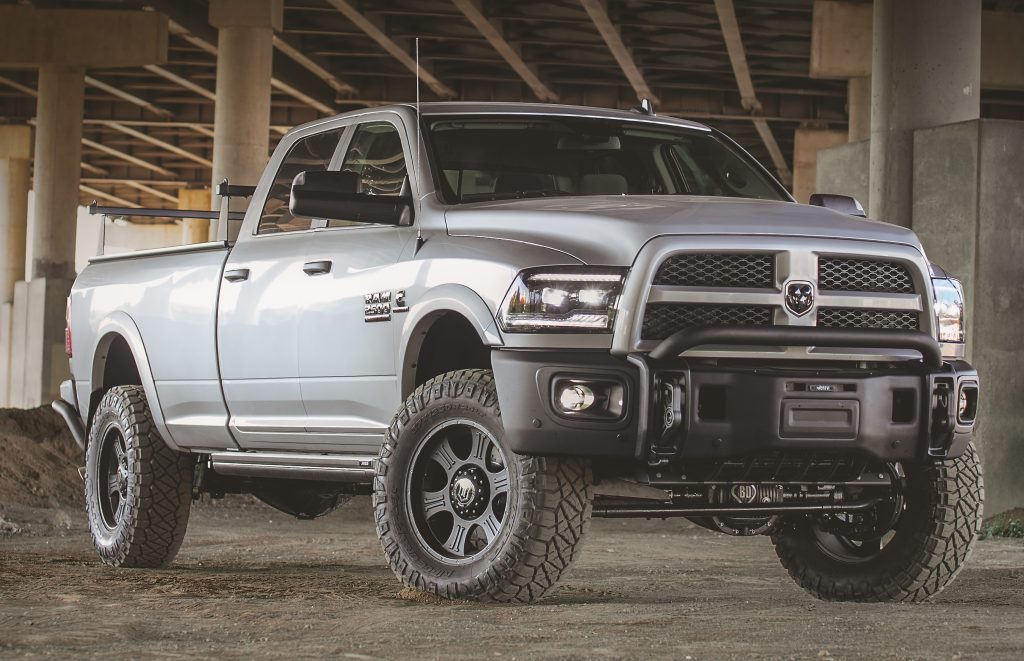2018 ram 2500 cummins diesel truck with suspension lift kit under bridge