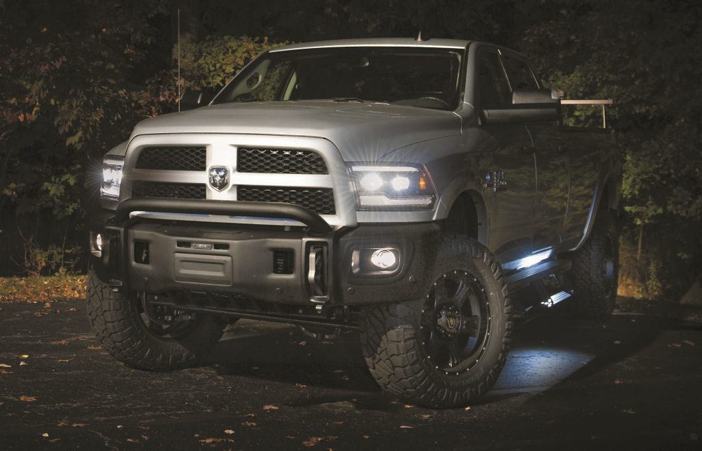2018 ram 2500 diesel truck in dark parking lot with lights on