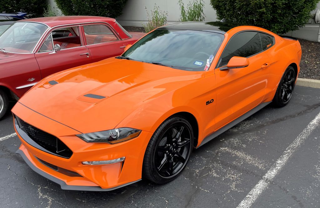orange ford s550 mustang 5 liter coyote v8