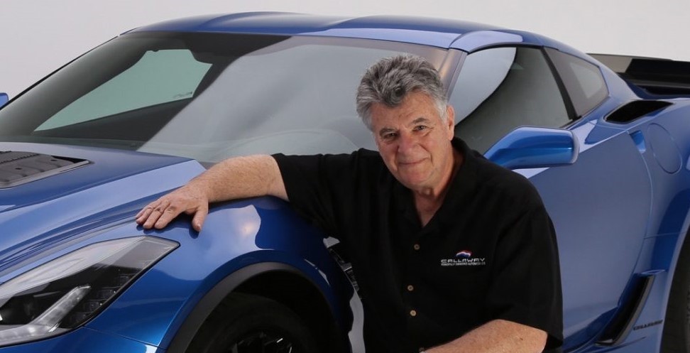 Reeves Callaway in promotional photo next to blue c7 Chevy Corvette