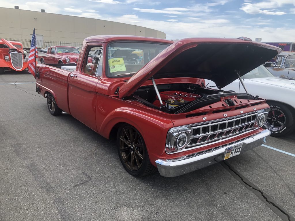 passenger side quarter view of a 1965 Ford F100 truck