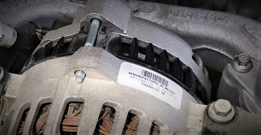 close up of remanufactured sticker on an ford coyote alternator