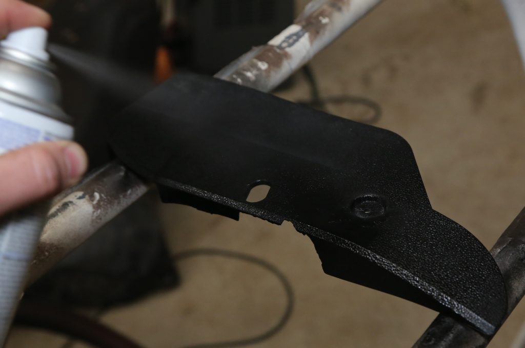 old broken piece of plastic automotive trim