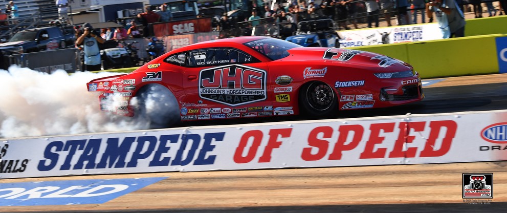 bo butner pro stock car doing a burnout at starting line