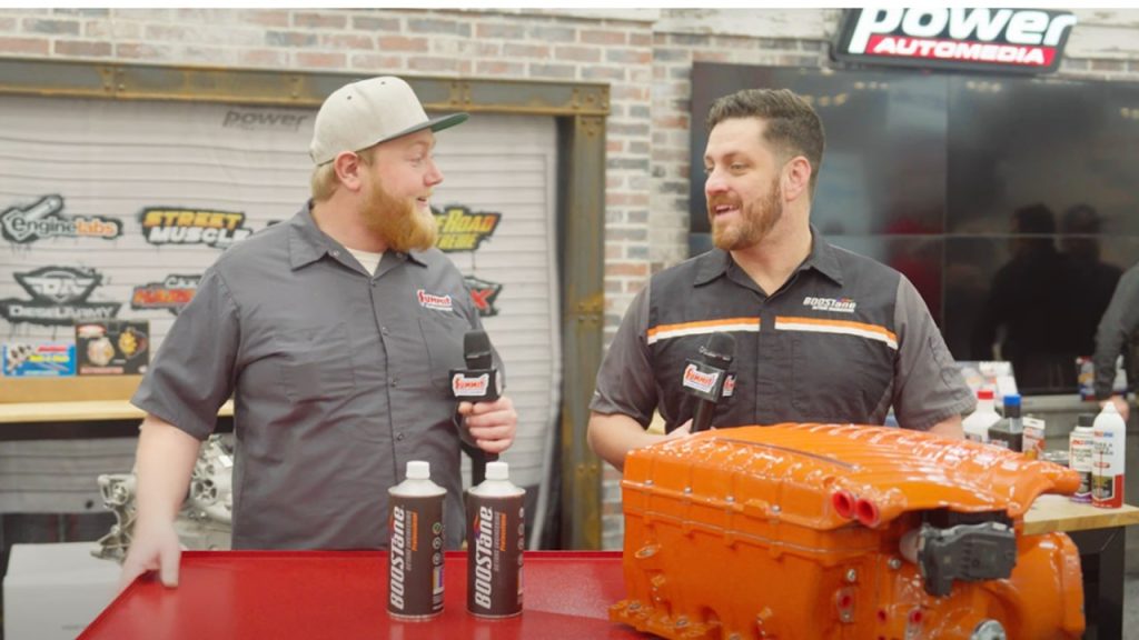 two men during an interview at a trade show