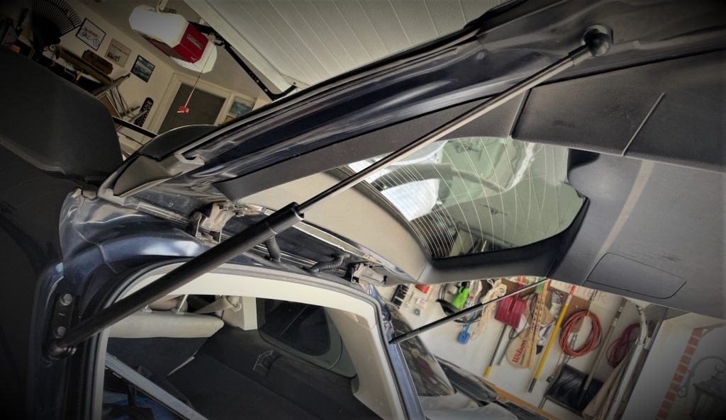 new lift support struts installed on a subaru outback hatch