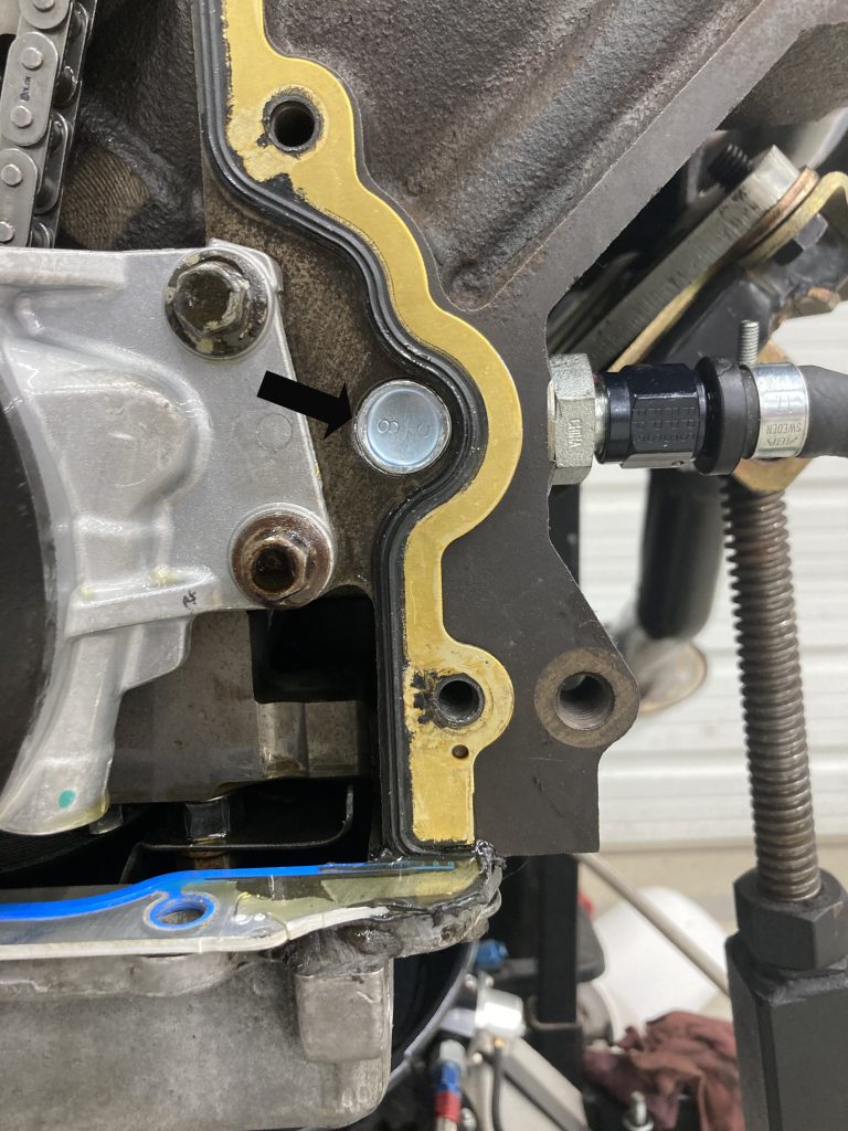 close up of plug in an engine block