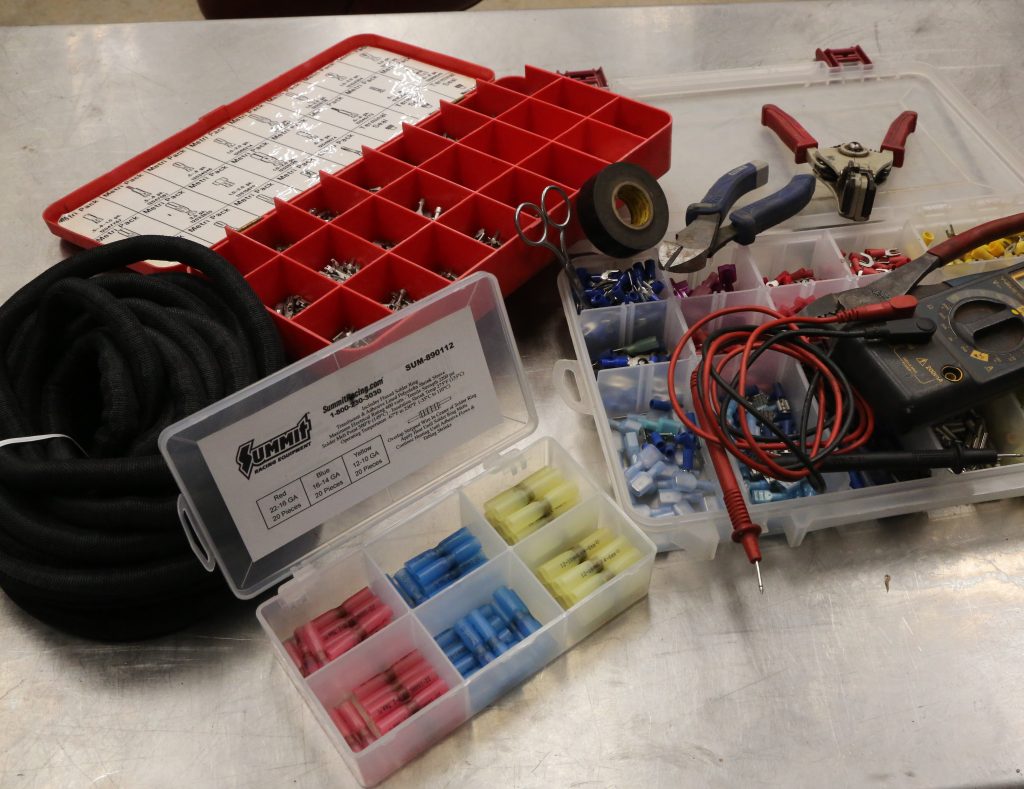 an assortment of wire repair tools & connectors