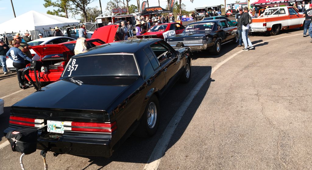 group of cars lined up for a drag race