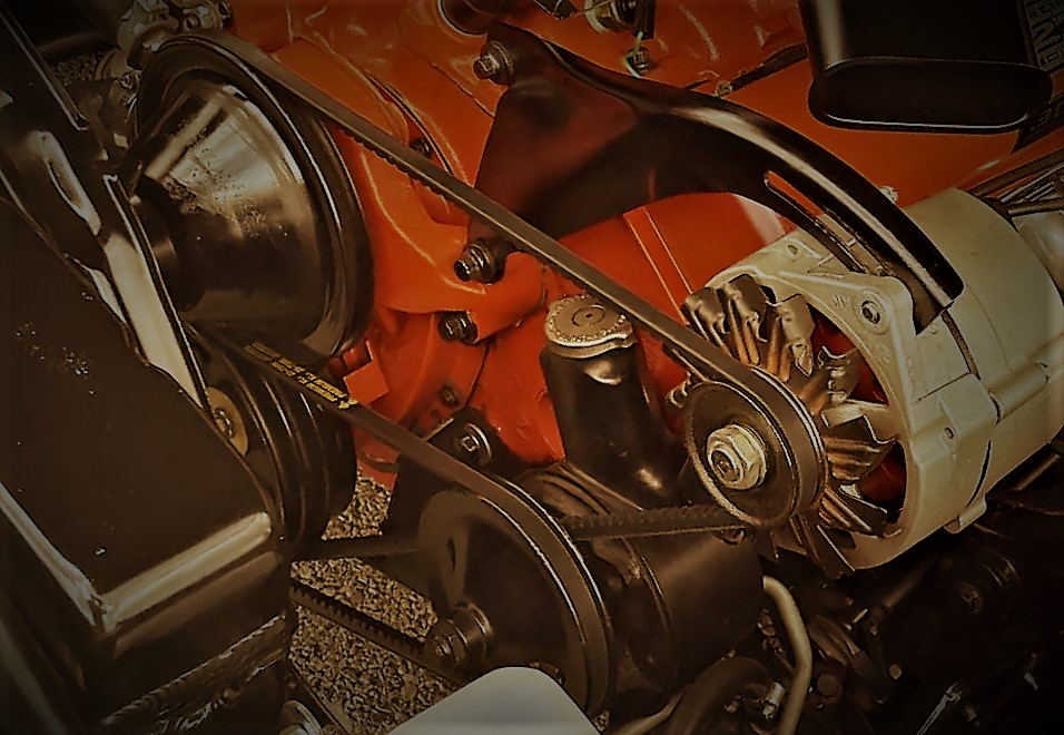 close up of V-belts on a 327 Chevy engine