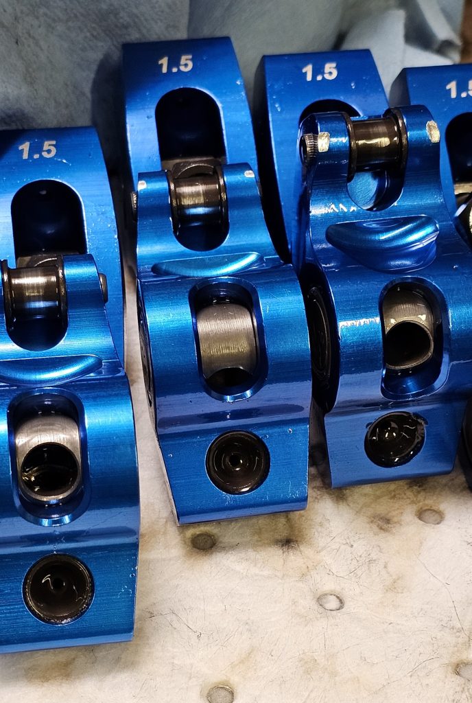 a collection of rocker arms on a table