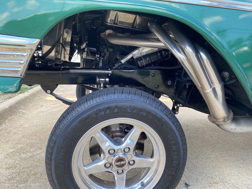 fender well side exit headers in a 1956 chevy gasser