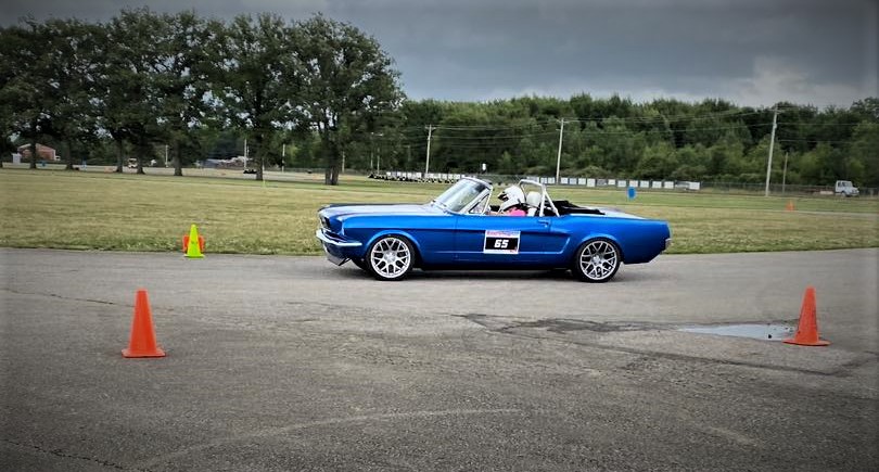 vintage mustang on an autocross course