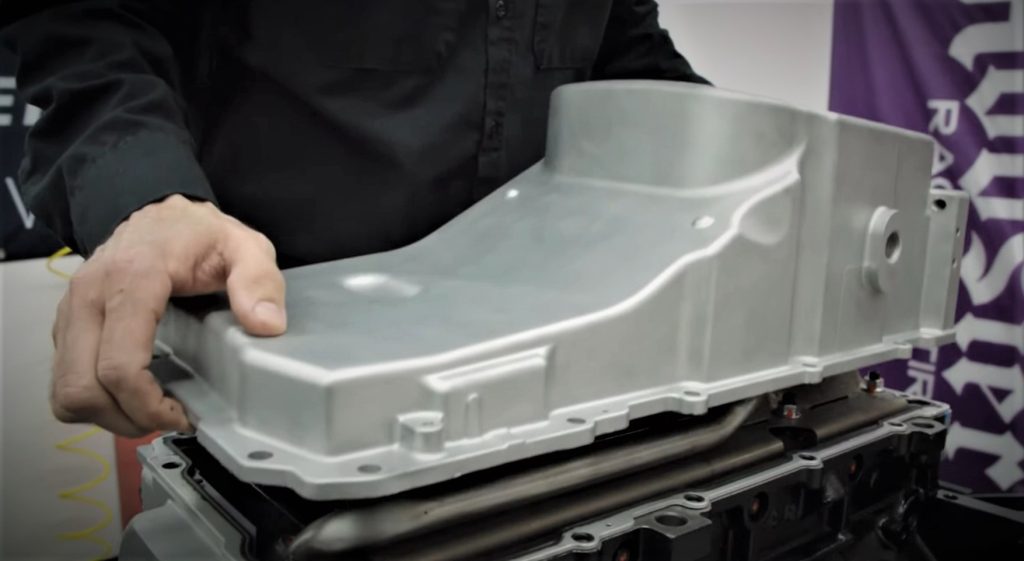 oil pan getting installed on an ls v8 engine