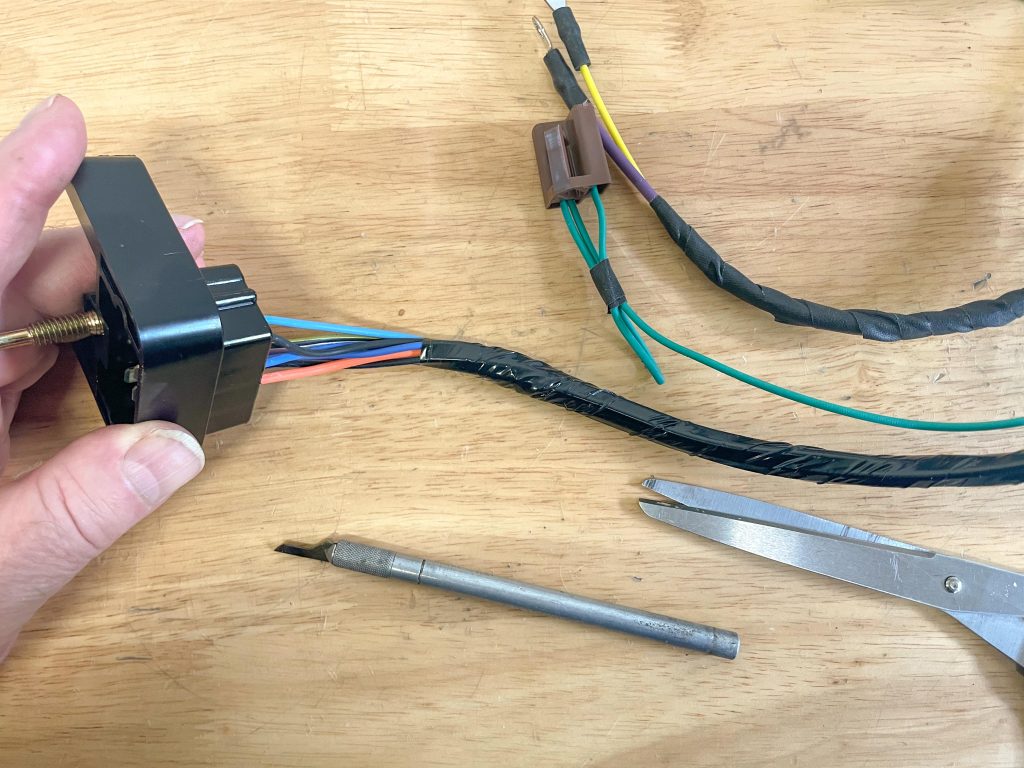 Removing wiring harness wrap