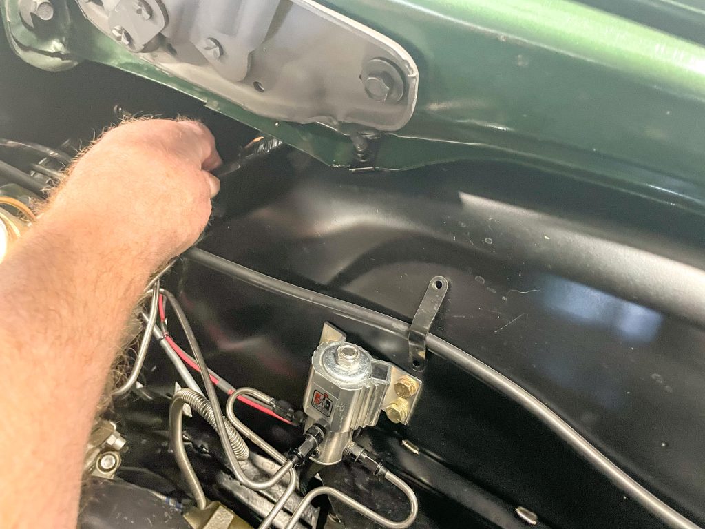 Rerouting wiring harness