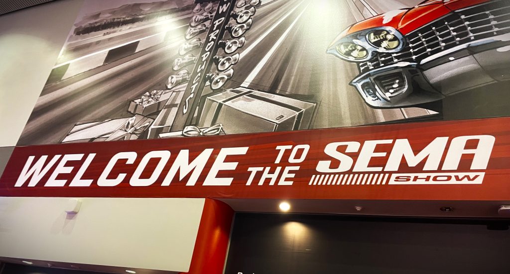 Stylized SEMA Show entrance Banner