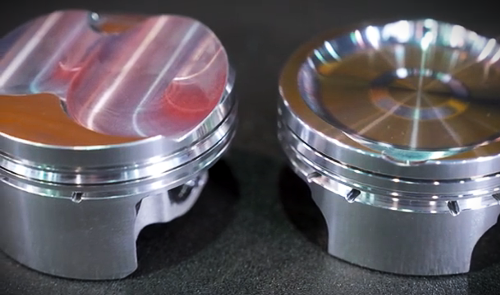 a pair of piston heads on a display table