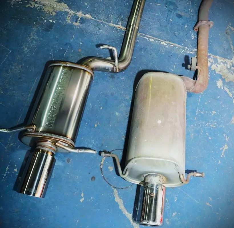 side by side comparison of two exhuast systems & mufflers