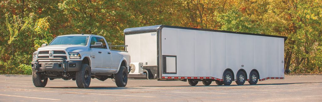ram truck pulling a large trailer