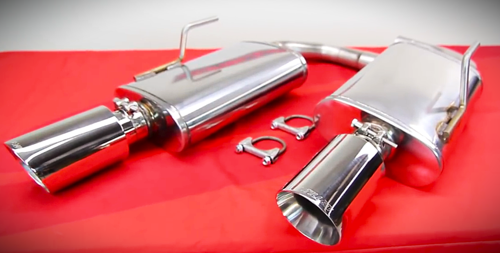 a pair of mufflers on a display table