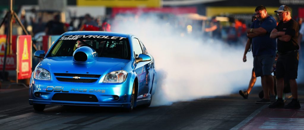 chevy cobalt dragster doing a burnout