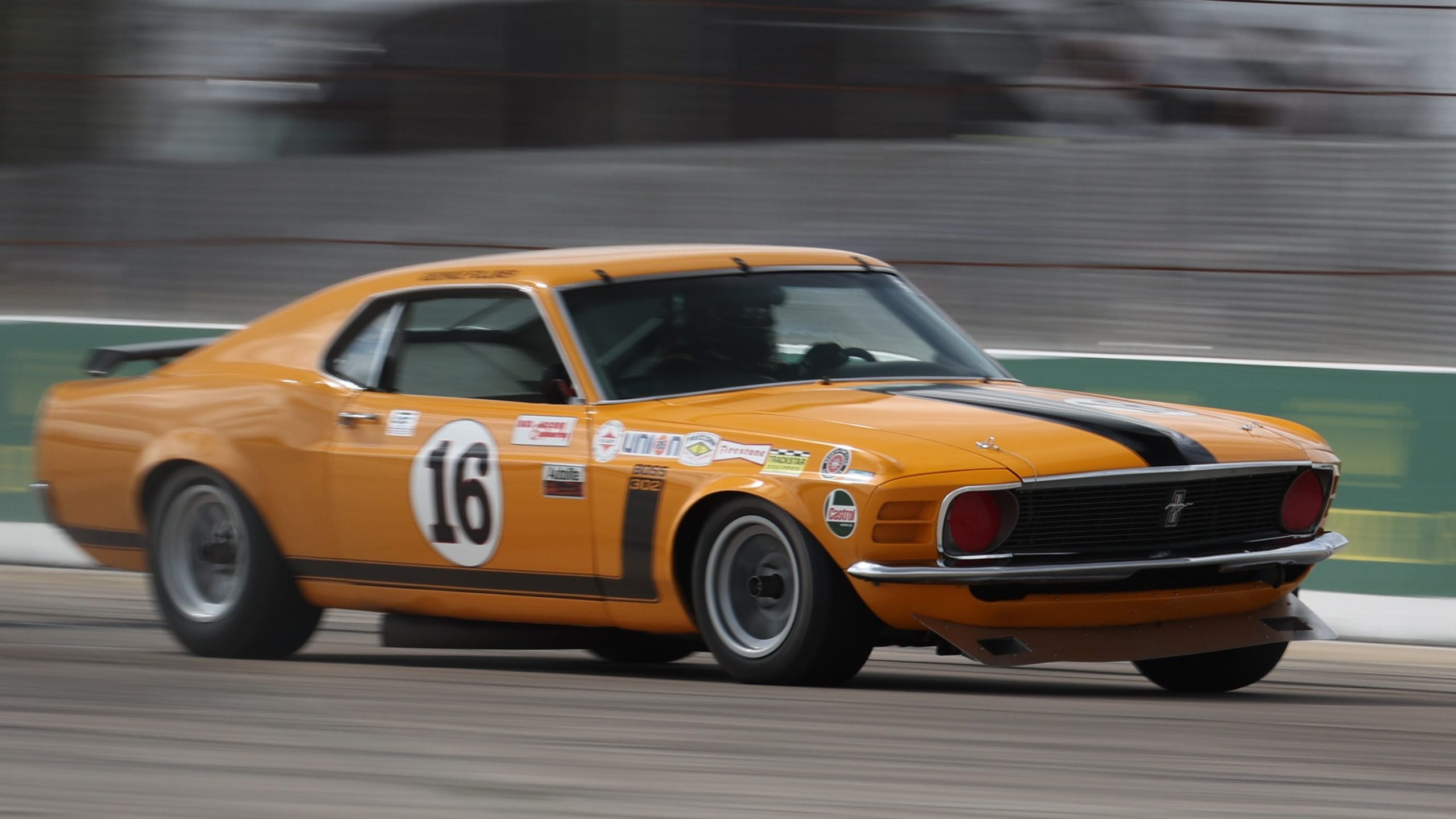 Vintage Ford Boss 302 Mustang Trans Am car on track