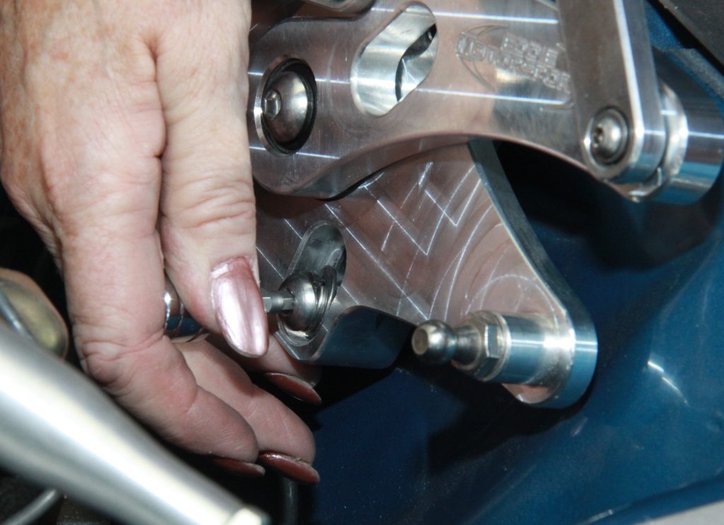 Installing Eddie Motorsports hood hinge on inner fender
