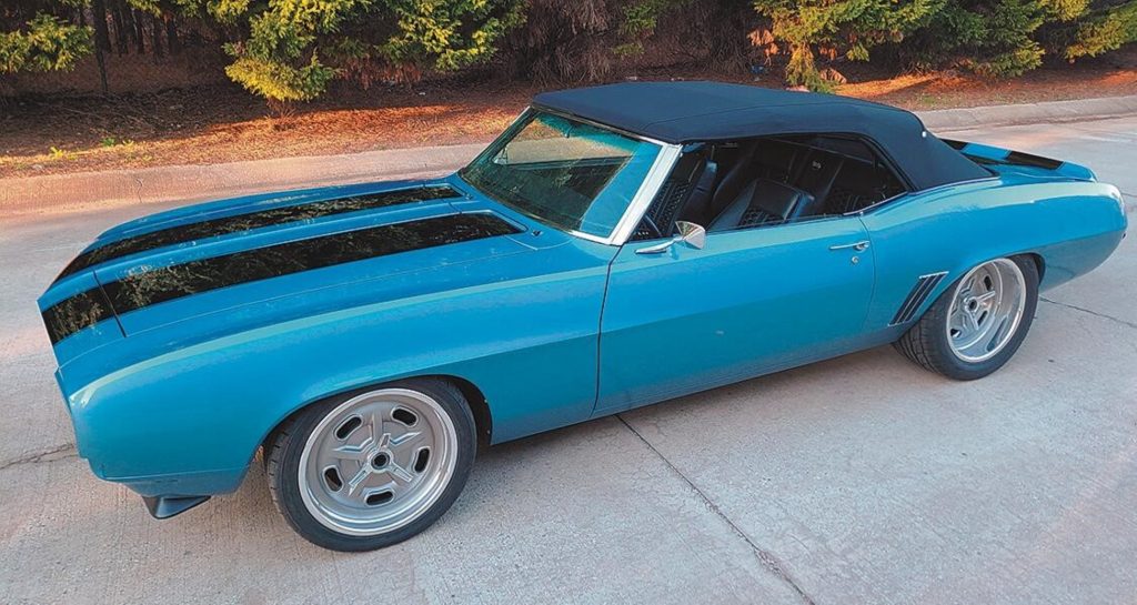 blue 1969 camaro with mathcing blue convertible top