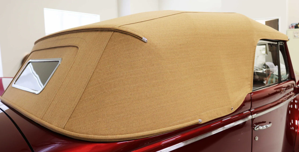 close up of a custom convertible top on an old car