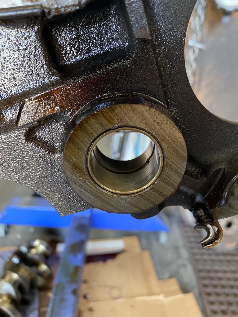 oil pump bushing in an engine block