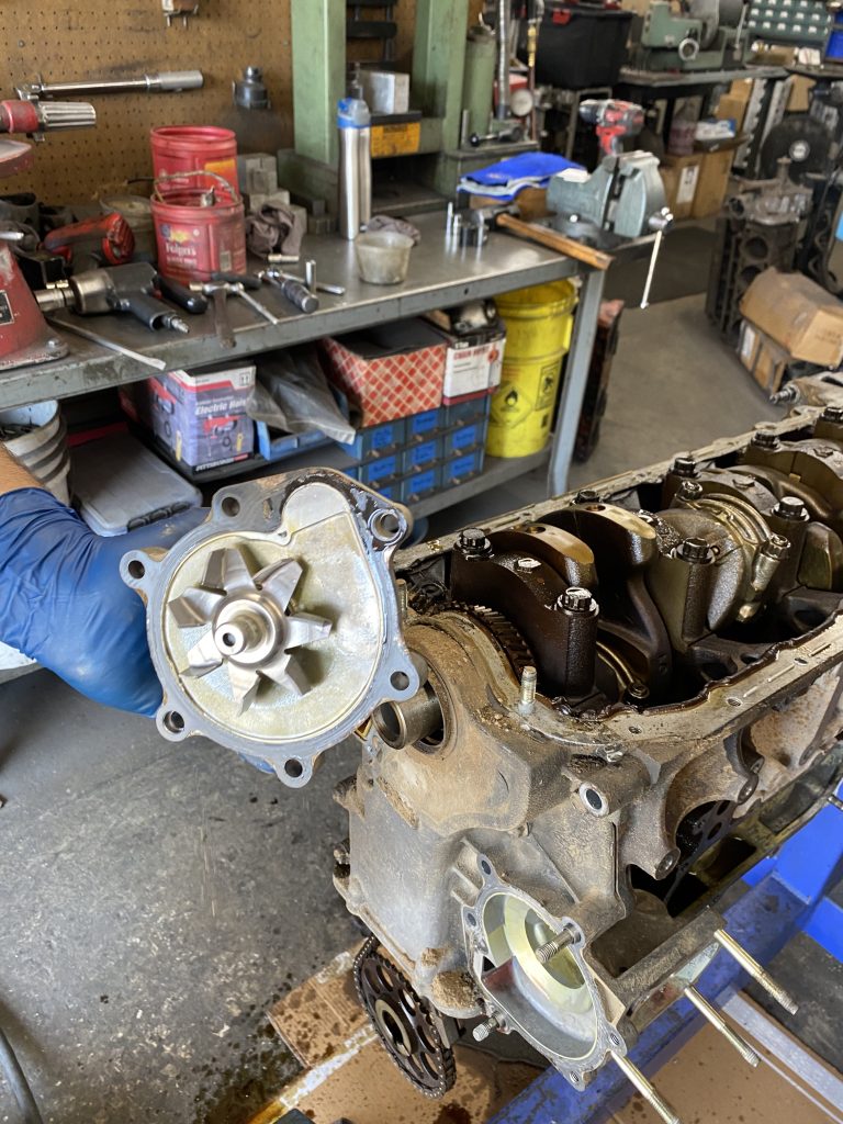 Water pump removed from an engine