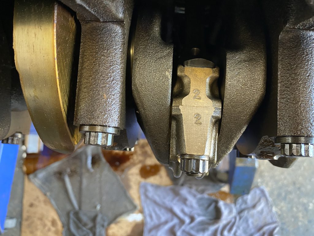 Close up of connecting rod bolts installed