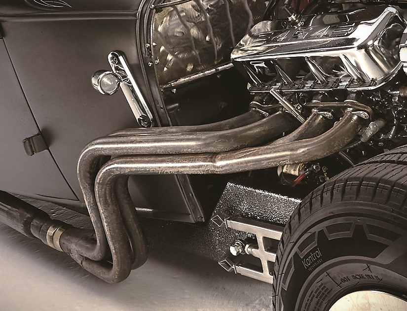 close up of headers on a hot rod