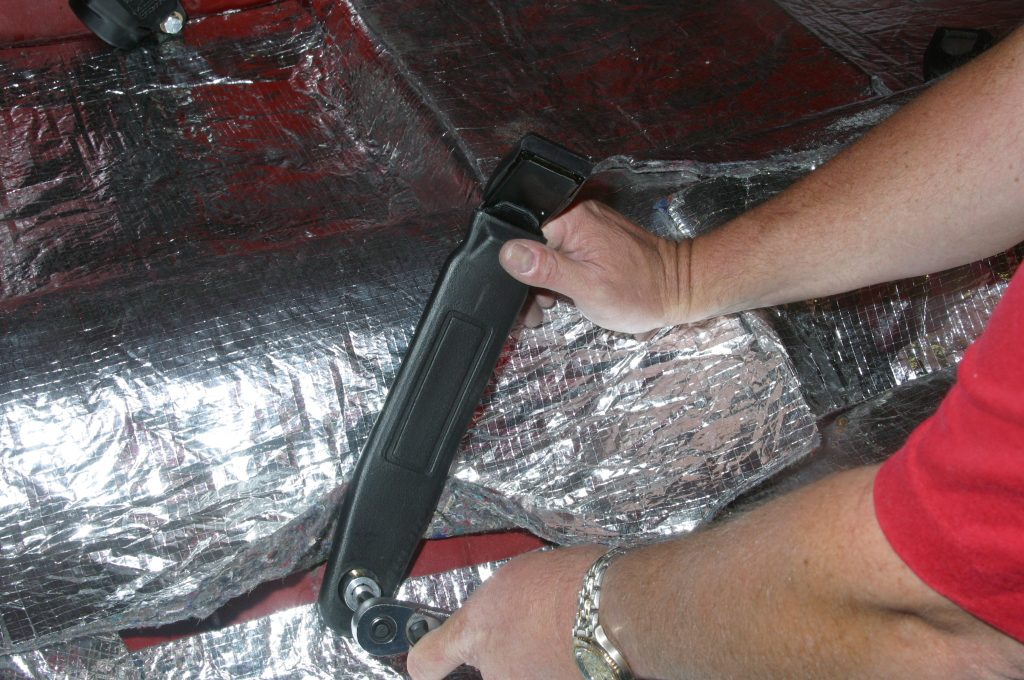 Installing lap belt buckle