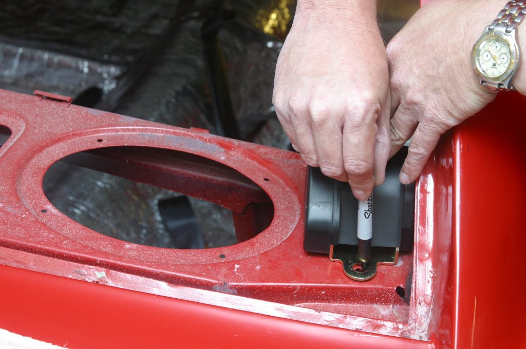 Installing rear seat belt retractor