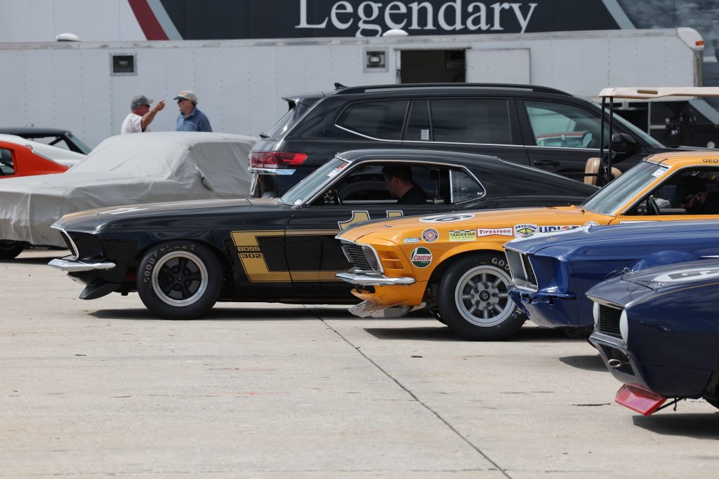 front profile shot of vintage trans am cars in paddock