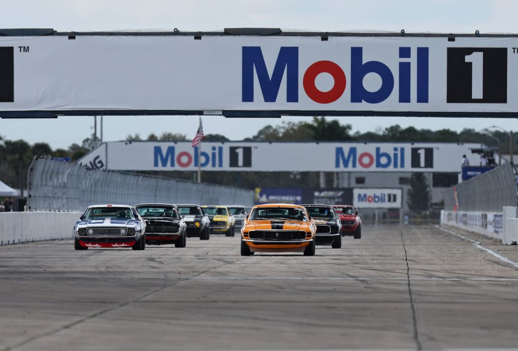 starting grid of vintage trans am race cars, close