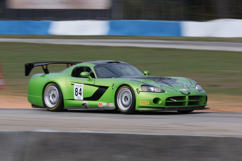 green dodge viper race car on track, side